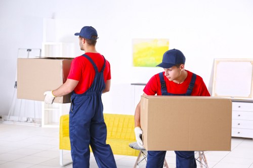 Removal van and moving boxes prepared for a house move in Balham