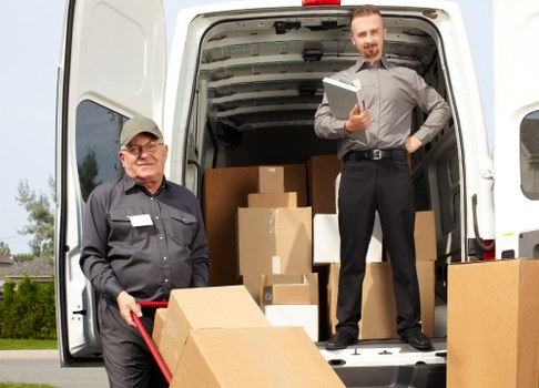 Local removals team handling a move in Balham near residential flats