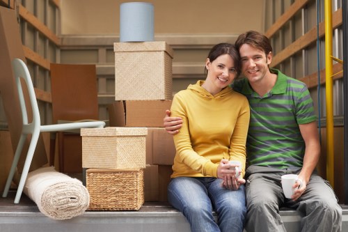 Loading furniture into a van for transport in Balham