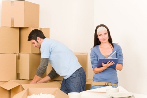 Moving team loading furniture for a Balham property
