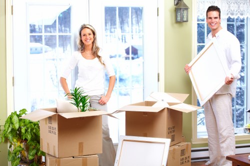 Careful packing of fragile belongings by a moving team in Balham